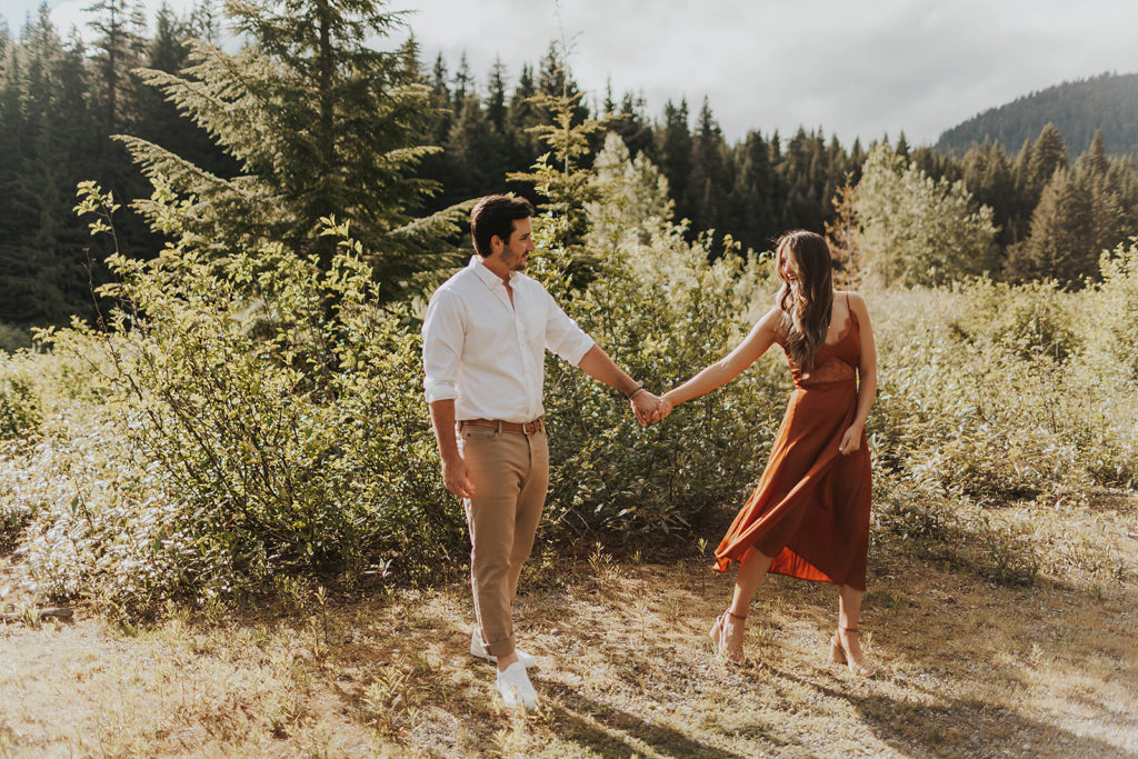 engagement-photos-dancing-in-front-of-trees