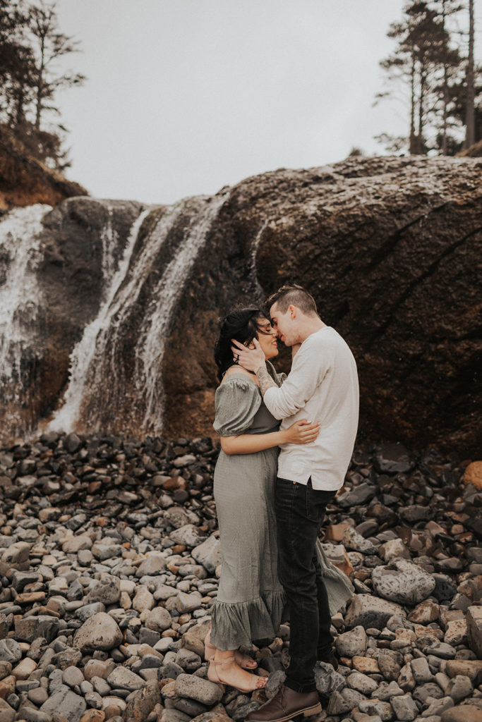 beach-engagement-smooth-rocks-and-waterfall