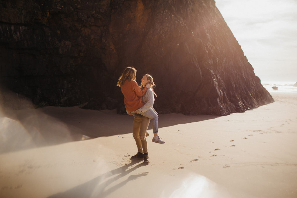 Oregon Coast couples session, two females embrace on beach