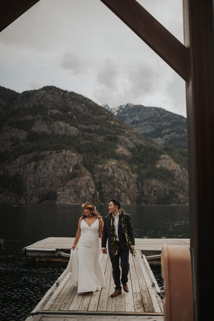 bride and groom holding hands at national park elopement