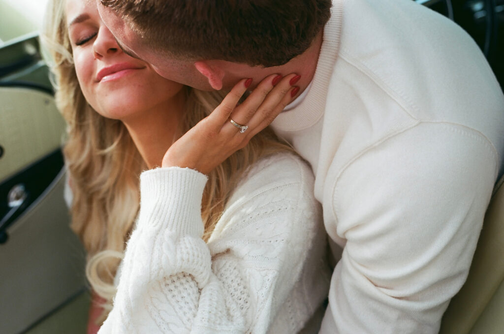 Couple sharing embrace on 35mm film at a Royal City, WA engagement session.