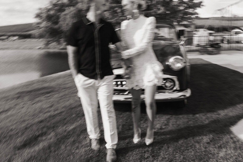 alicia + nathan in front a a vintage car at their Royal City, WA Engagement Session