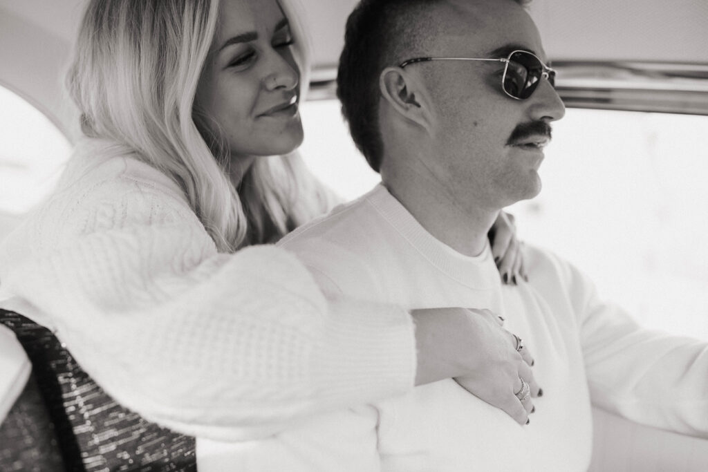 Royal city engagement session portrait of couple in car.