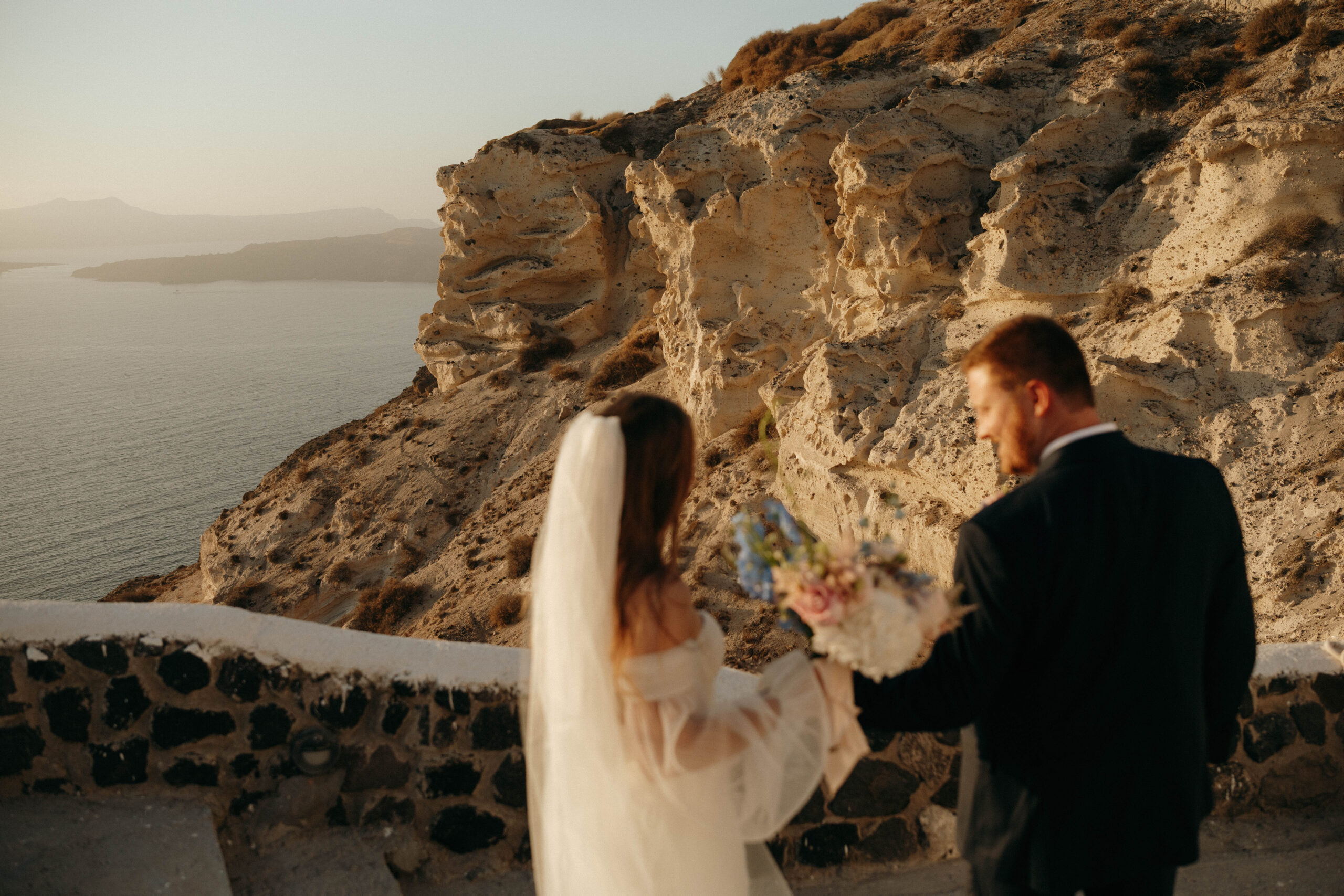 couple eloping in santorini, destination wedding photographer