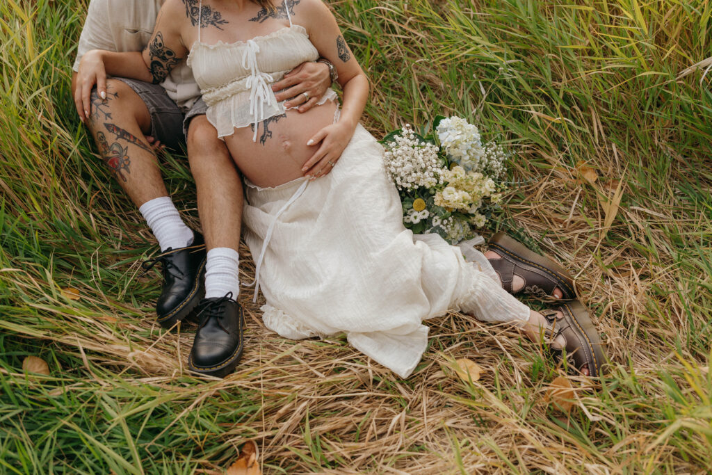 PNW dreamy maternity session in open field with Birkenstocks and florals

